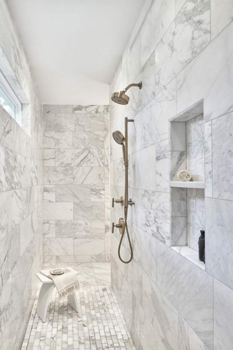 Another small bathroom design idea for maximizing space is installing a luxurious walk-in shower.
