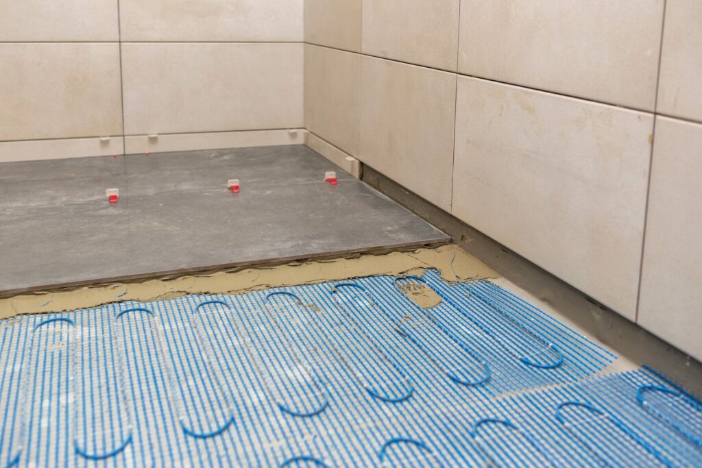 Heated bathroom floors use electric coils to produce heat.