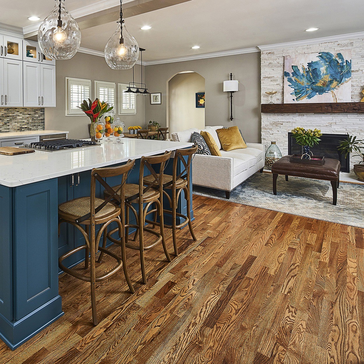 Marble fireplace with reclaimed beam mantel
