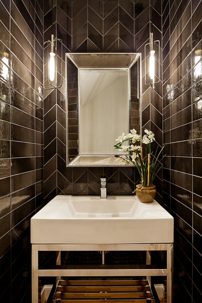 horizontal soldier stack tile with chevron accent wall in powder room; Tile Design Ideas in Charlotte, NC
