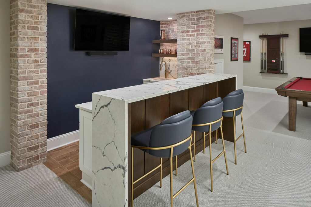 a quartz waterfall countertop in a basement