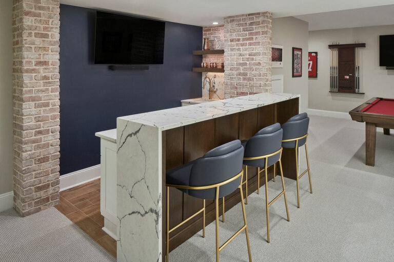 a quartz waterfall countertop in a basement