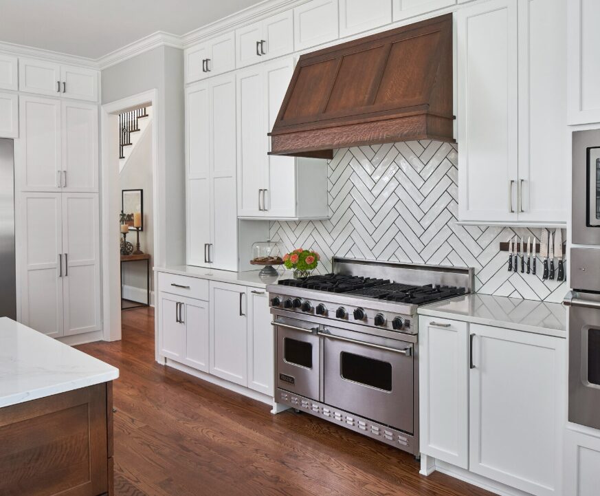 white tile laid in a chevron pattern