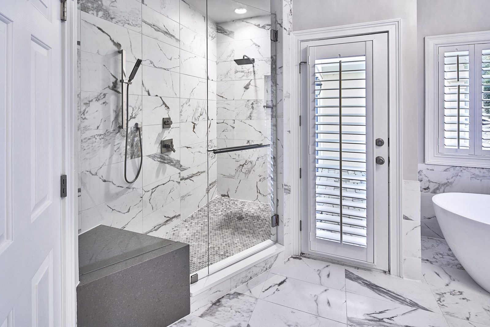 Alcove shower design with quartz bench; shower upgrades