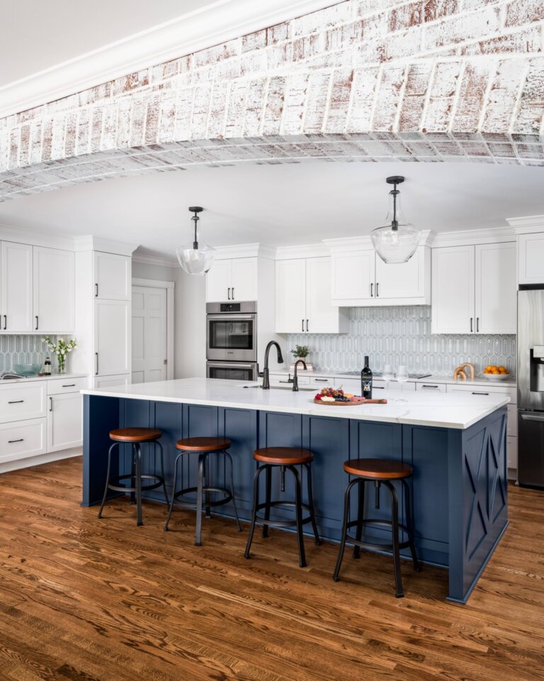 kitchen archway that features whitewashed brick