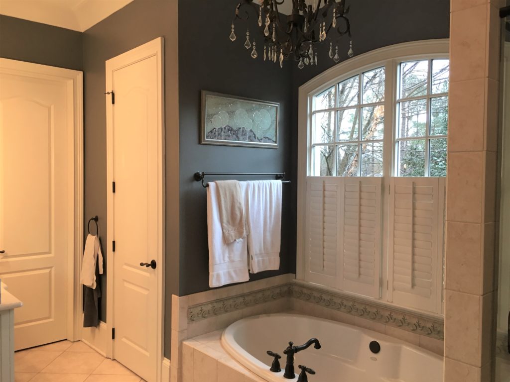 this dark master bathroom got a bright and modern makeover 