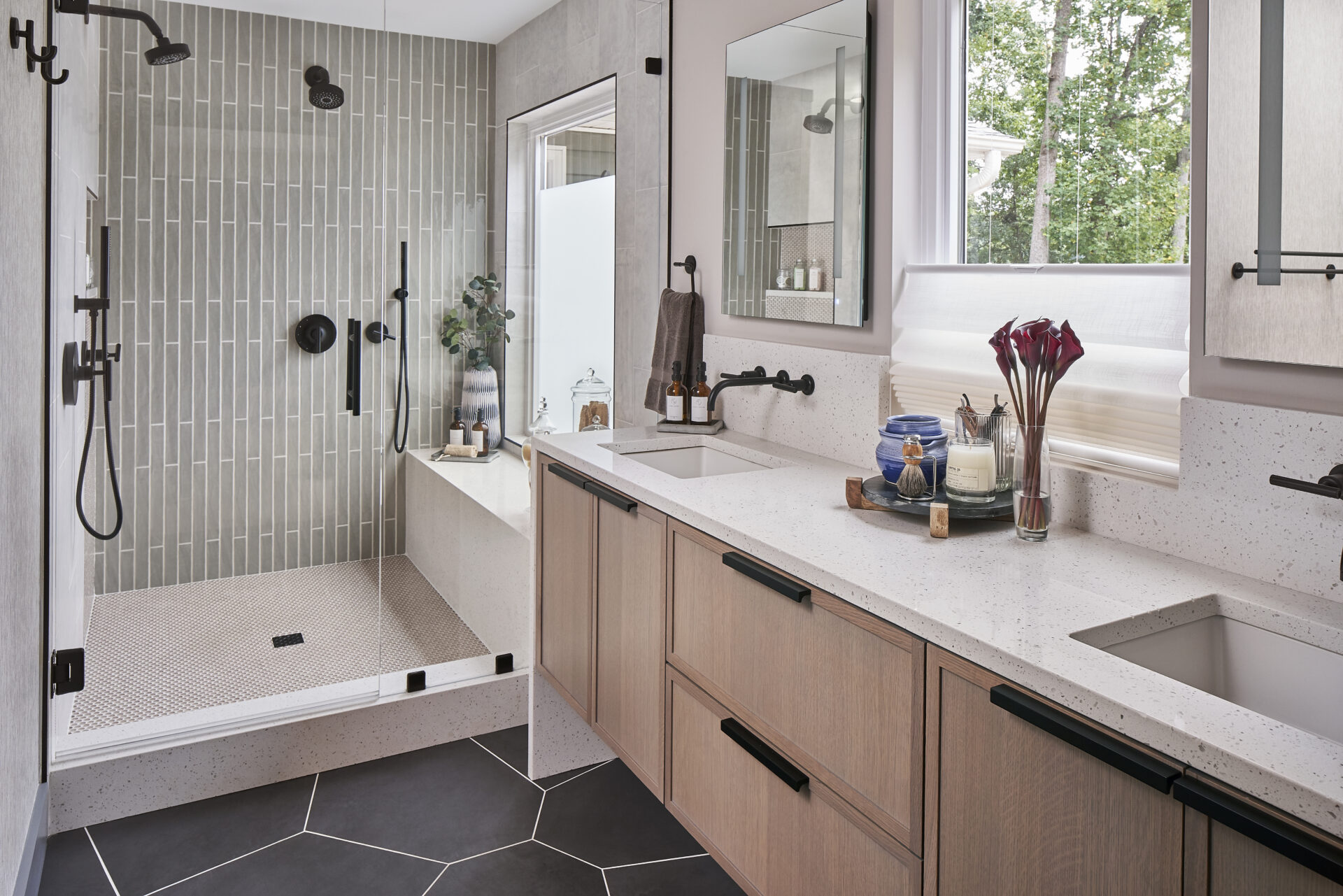Simple minimalist bathroom with wooden cabinets, featuring clean lines and a neutral color palette.