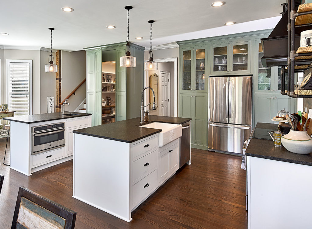 Custom farmhouse kitchen design with reclaimed beam