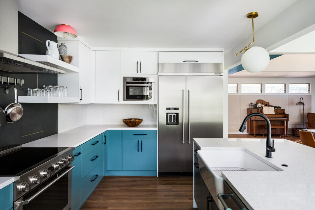 Vibrant blue slim shaker cabinets in an open kitchen space.