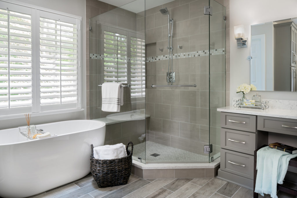 Grey_toned_wood_look-porcelain_tile_flooring_in_a_master_bath_wood_tile_shower