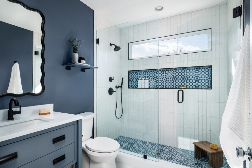 boys' blue bathroom remodel with bathroom vanity and walk-in shower