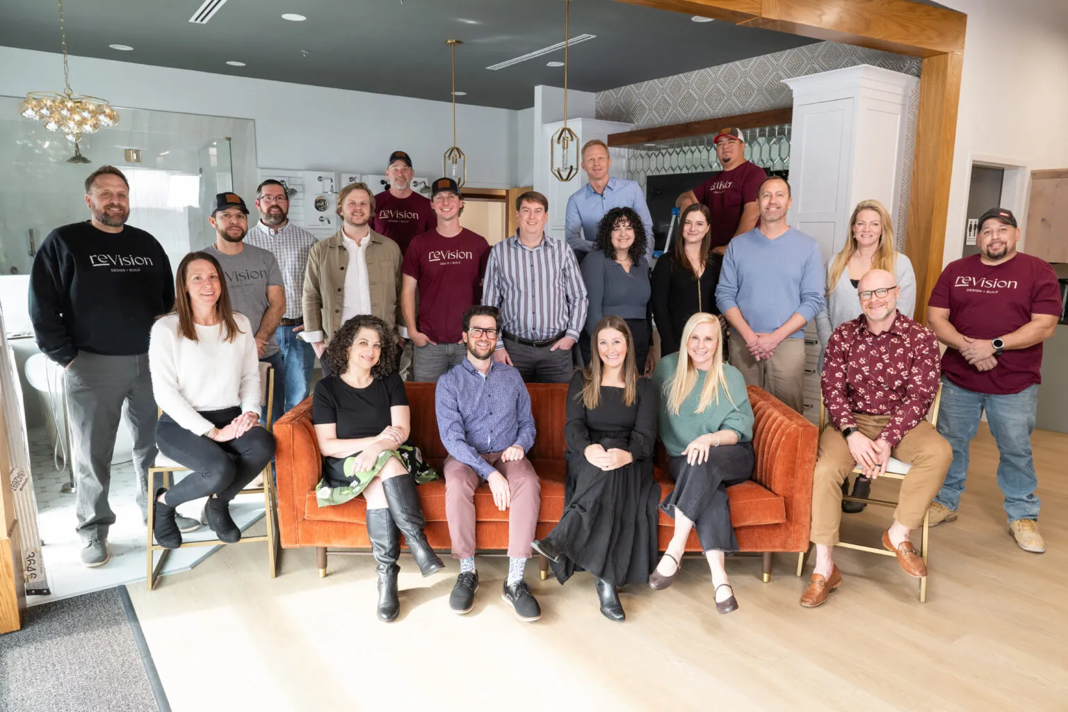 ReVision Design + Build remodeling team posing together