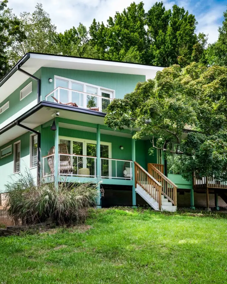 Second-story addition with seafoam siding at Color Pop Revival